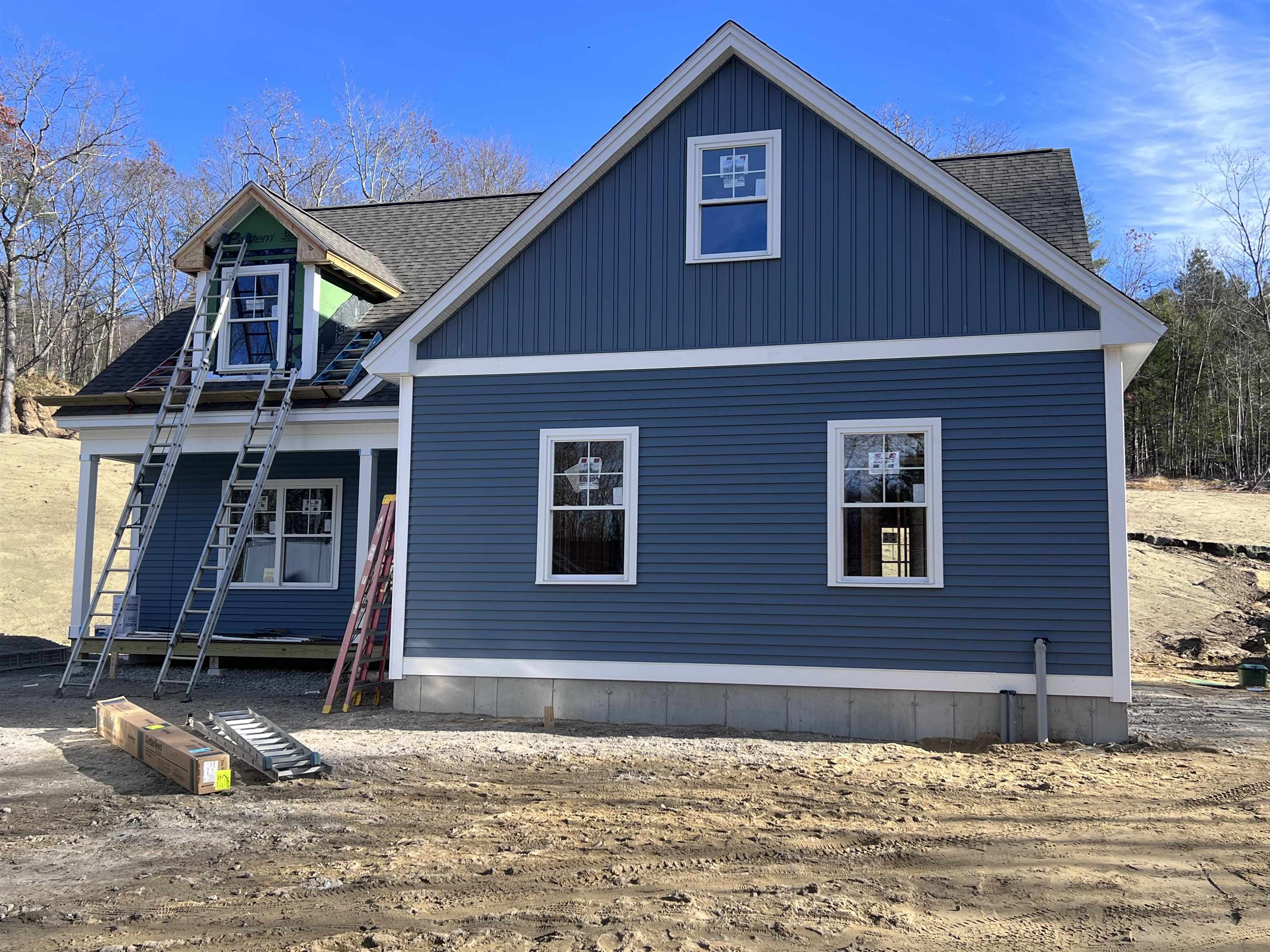 Under Construction: This 2,588 square foot craftsman style home, situated on a ±2.11 acre lot, offers four bedrooms, three and a half bathrooms and a thoughtful layout designed for modern living. The first floor primary suite features a walk-in closet and a private bathroom with stand up shower.  The open floor plan seamlessly connects the kitchen, dining and living areas creating an ideal space for entertaining or relaxing.  A second floor primary suite is currently being framed adding approximately ±350 square feet of  finished space.  The suite includes a double vanity, 60" walk-in shower, second walk-in closet with office, study or relaxation area.  Planned finishes include solid surface countertops, custom cabinetry and trim, hardwood, carpeting and tile flooring.  An energy-efficient heating and cooling system with an on-demand water heater adds comfort.  The mudroom, first-floor laundry and spacious two-car garage add convenience and function, while the unfinished basement provides plenty of storage and room for future expansion.  Please do not enter the property without an appointment.