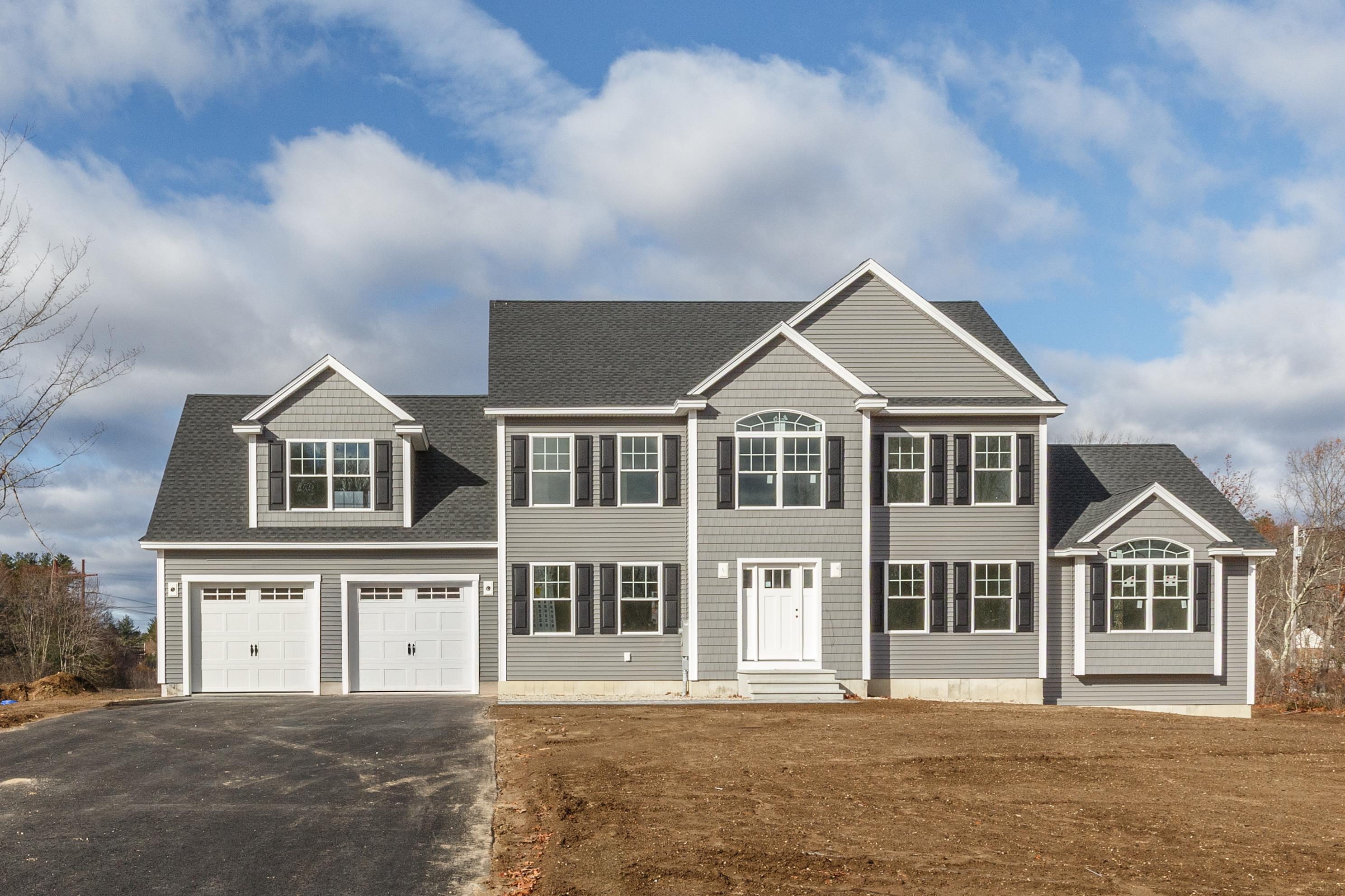 Welcome to this brand new 4-bedroom colonial, offering over 3,000 sq. ft. of thoughtfully designed living space in a desirable new community with town water and a prime location. Built with exceptional quality craftsmanship by David Mendes, this home blends modern comfort with timeless style.  Step inside to an open and spacious floor plan, highlighted by a stunning family room with a vaulted ceiling—perfect for gathering and entertaining. The gourmet kitchen and dining area flow seamlessly for everyday living.  The second floor features a beautiful primary suite complete with a walk-in closet and a luxurious private bath, along with three additional well-sized bedrooms.  An attached garage, energy-efficient construction, and premium finishes throughout complete this impressive property. A wonderful opportunity to own a meticulously built home in a growing neighborhood.