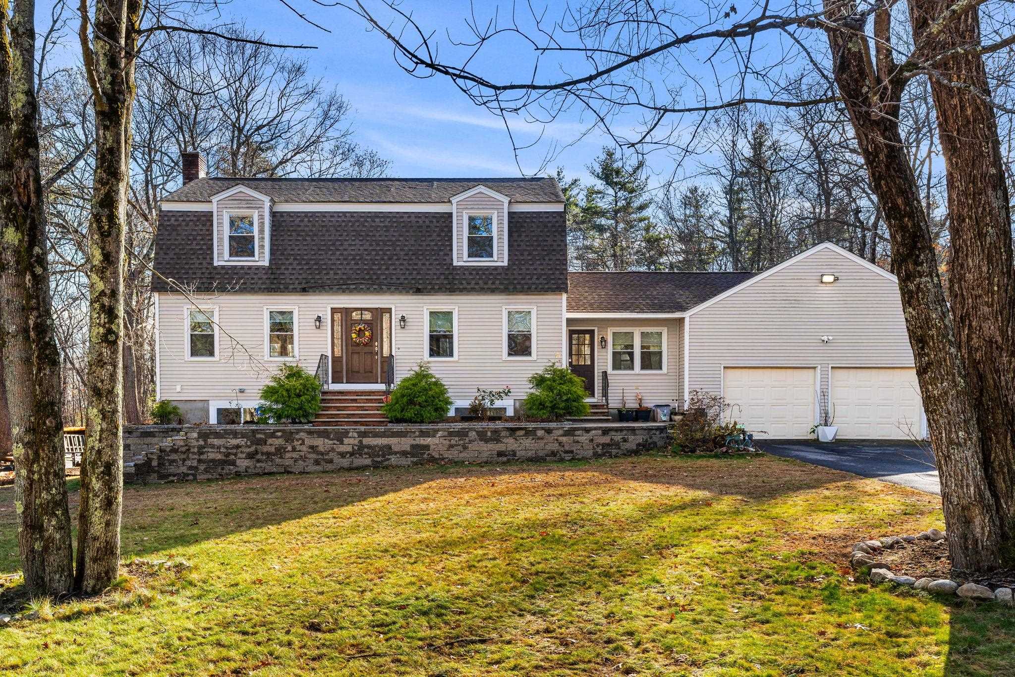 Fabulous Cape on 2.45-acre lot w/gorgeous in-law apartment and above ground pool! Step inside, a heated mudroom joins the 2-car heated garage and main kitchen. Lots of counter and cabinet space make this kitchen perfect for entertaining and family gatherings. Just off the kitchen is a 500+ sqft deck overlooking the backyard. A formal dining area is just around the corner while another dining space adjacent to the family room is complete with a wet bar. Next you walk through the large family/living room w/beautiful maple hardwood flooring that runs throughout the first floor. On the second level you find 2 large bedrooms with radiant floor heat and the front to back primary bedroom with a walk-in closet, an additional closet, bathroom and radiant floor heat. Oak hardwood flooring runs throughout second level. Basement recently updated to include a full kitchen w/Viking gas stove and pot filler, new refrigerator and dishwasher. New granite countertops and oversized granite island are a huge plus in this beautiful space. A spa-like bathroom is complete with tiled shower, tile flooring, new vanity, lighting and paint. Washer and dryer are on this level, while around the corner is a bedroom w/walk-in closet. The large living room has a beautiful granite mantled, wood-burning fireplace. All new tile flooring runs throughout this space. Loft storage in garage, newly paved driveway can fit 10 cars. Schedule your showing today and be home for the new year!