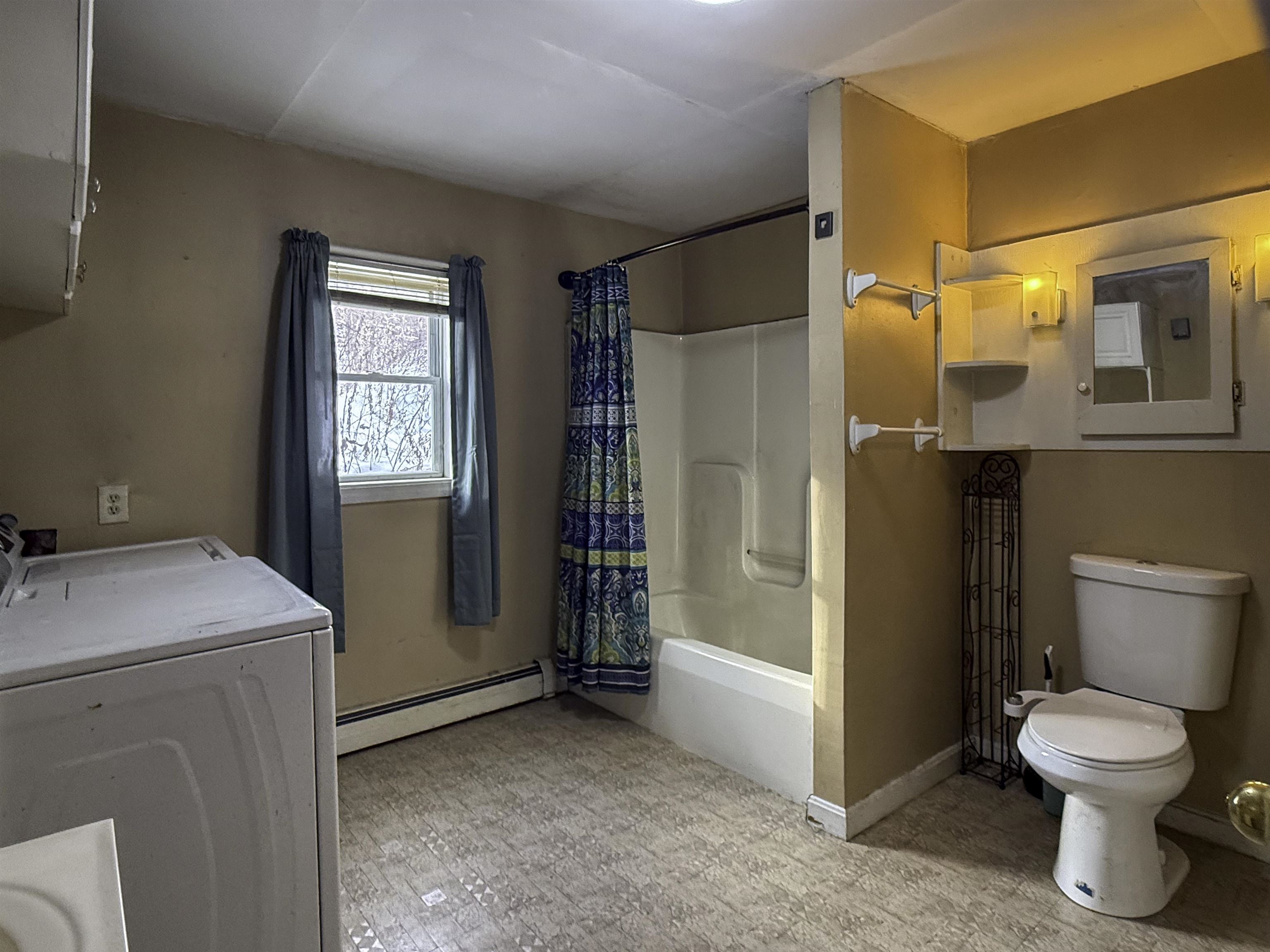 Main level Bath with Laundry 24530149