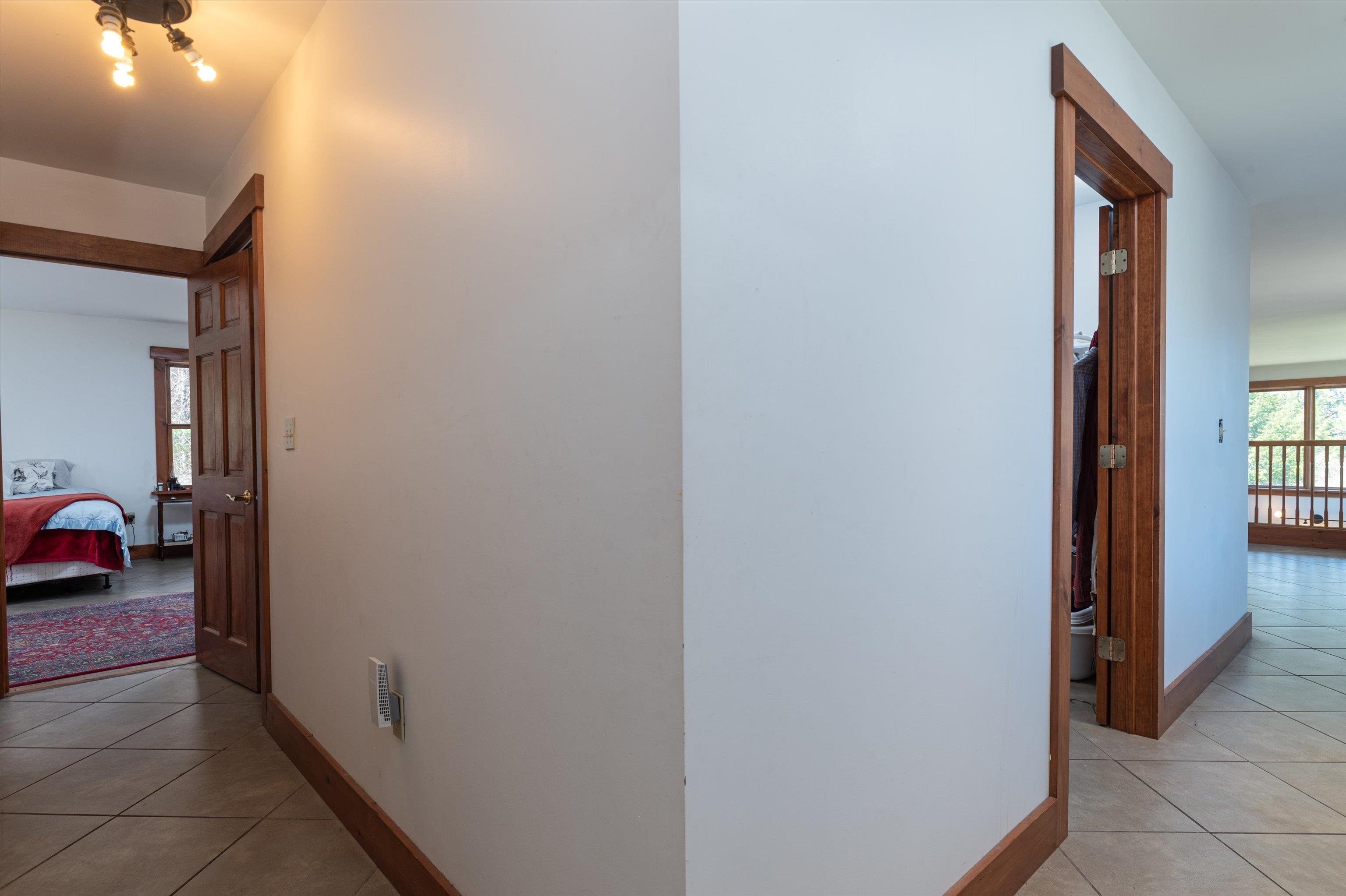 2nd Floor Hallway to Primary and Laundry 24566493