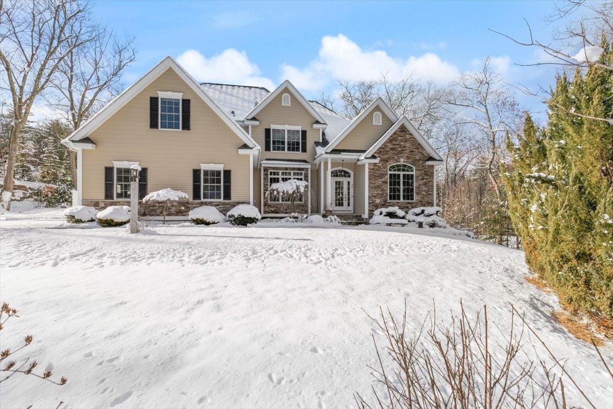 Designed for those who value craftsmanship, comfort, and an elevated way of life. Set in one of Windham’s most sought-after locations, this exceptional 4-bedroom, 3-bath home is anything but cookie-cutter. Thoughtfully designed with attention to detail at every turn, the home blends timeless elegance with modern comfort in a way that feels both refined and welcoming. At the heart of the home is a chef’s dream kitchen, featuring custom cabinetry, high-end finishes, and a layout designed for both everyday living and elevated entertaining. The first-floor primary suite offers a true retreat—perfectly positioned for convenience and privacy—with a spa-inspired bath and generous closet space. Sun-filled living areas flow effortlessly, showcasing quality craftsmanship, custom finishes, and intentional design choices that elevate the everyday. Each additional bedroom is well-appointed, offering flexibility for guests, work-from-home space, or growing needs. Adding to the home’s appeal are deeded rights to Rock Pond, providing a rare lifestyle bonus—whether it’s peaceful mornings by the water, kayaking, or simply enjoying the natural beauty just steps away. This is a home for those who appreciate character, quality, and a setting that’s hard to replicate. Luxury, location, and lifestyle—done right.